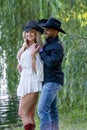 A Beautiful Young Interracial Couple Pose For Their Engagement Photographs Outdoors Royalty Free Stock Photo