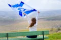 Israeli jewish little girl with Israel flag back view. Royalty Free Stock Photo