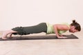 Beautiful young lady doing yoga