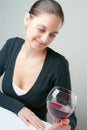 Beautiful young lady with a glass of wine Royalty Free Stock Photo