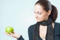 Beautiful young lady with green apple Royalty Free Stock Photo