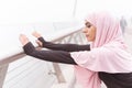 Calm Muslim woman on the bridge stock photo Royalty Free Stock Photo