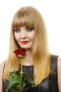 Beautiful young lady with red rose. Royalty Free Stock Photo