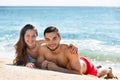 Beautiful young lovers sunbathing Royalty Free Stock Photo