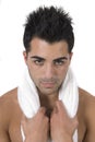 Beautiful young man face with towel Royalty Free Stock Photo