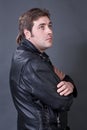 Beautiful young man in a leather jacket Royalty Free Stock Photo