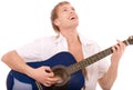 Beautiful young man plays guitar Royalty Free Stock Photo