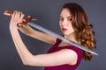 Beautiful young militant pure princess girl with a sword Royalty Free Stock Photo