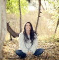 Beautiful Young Millennial Hispanic, American Indian, Multi-racial Woman Throwing Leaves Royalty Free Stock Photo