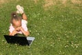 Beautiful young mixed race girl using laptop Royalty Free Stock Photo