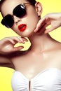 Beautiful young model with big sunglasses. Fashion makeup Royalty Free Stock Photo