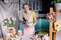 Modern housewife cooks in the kitchen. portrait of a woman cook with mixer. Preparing for Easter Royalty Free Stock Photo