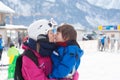 Beautiful young mom and her toddler boy, skiing in the mountains Royalty Free Stock Photo