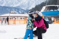 Beautiful young mom and her toddler boy, skiing in the mountains Royalty Free Stock Photo