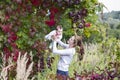 Beautiful young mother with a baby girl in flower field Royalty Free Stock Photo