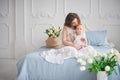 beautiful young mother with baby girl in her arms. The concept of a happy family, motherhood. mother playing with her baby in the Royalty Free Stock Photo