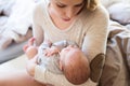 Beautiful young mother holding baby son in her arms Royalty Free Stock Photo