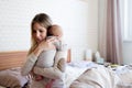 Beautiful young mother holding baby son in her arms Royalty Free Stock Photo