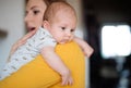 Beautiful young mother holding baby son in her arms Royalty Free Stock Photo