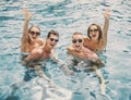 Beautiful Young People Having Fun in Swimming Pool Royalty Free Stock Photo