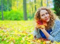 Plussize model in the autumn park