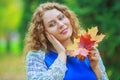 Plussize model in the autumn park