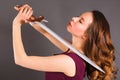 Beautiful young pure princess girl with a sword Royalty Free Stock Photo