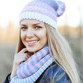 Beautiful young sensual blonde girl in hat and scarf in cold wea Royalty Free Stock Photo