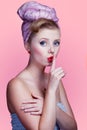 Beautiful young pin-up girl with surprised expression Royalty Free Stock Photo