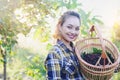 Beautiful young smart farmers Showing organic mulberry fruits