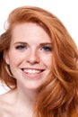 Beautiful young smiling woman with red hair and freckles isolated Royalty Free Stock Photo