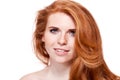 Beautiful young smiling woman with red hair and freckles isolated Royalty Free Stock Photo