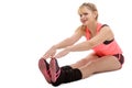 Beautiful young sportswoman doing stretching exercises Royalty Free Stock Photo