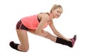 Beautiful young sportswoman doing stretching exercises Royalty Free Stock Photo