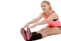 Beautiful young sportswoman doing stretching exercises Royalty Free Stock Photo