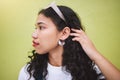 Beautiful, young stylish and carefree African American black millennial woman. Long curly hair, with sunglasses on her Royalty Free Stock Photo