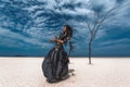 Beautiful young stylish tribal dancer. Woman in oriental costume dancing outdoors Royalty Free Stock Photo