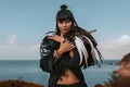 Beautiful young stylish tribal style woman outdoors portrait