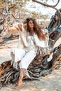 Beautiful young stylish woman having fun on the beach Royalty Free Stock Photo