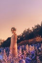 Beautiful young stylish woman posing on the field at sunset portrait Royalty Free Stock Photo