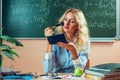 Beautiful young teacher making-up Royalty Free Stock Photo