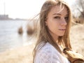 Beautiful young teenage caucasian woman in a plaid walking think Royalty Free Stock Photo