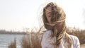 Beautiful young teenage caucasian woman in a plaid walking think Royalty Free Stock Photo