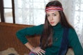 Beautiful young teenage girl hippie posing in room Royalty Free Stock Photo