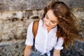 Beautiful young teenage girl in the old town. Royalty Free Stock Photo