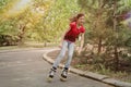 Beautiful young teenage girl roller skating Royalty Free Stock Photo