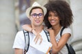 Beautiful young tourist couple posing in city Royalty Free Stock Photo