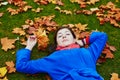 Beautiful young tourist in Paris on a fall day Royalty Free Stock Photo