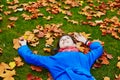 Beautiful young tourist in Paris on a fall day Royalty Free Stock Photo