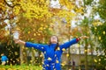 Beautiful young tourist in Paris on a fall day Royalty Free Stock Photo